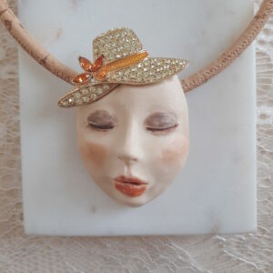 face necklace by french ostrich