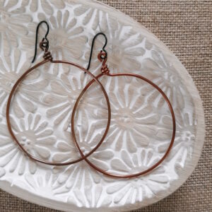 large copper hoop earrings by french ostrich