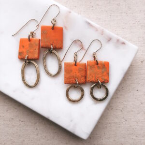 orange and gold earrings by french ostrich