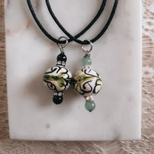 green sicilian bead necklace with black adjustable cord by french ostrich