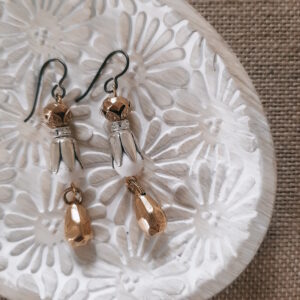 mixed metal earrings with white faceted beads by french ostrich