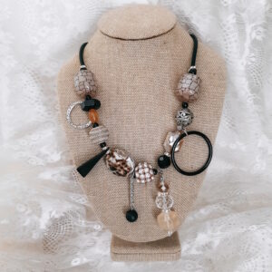 statement necklace with neutral color vintage beads by french ostrich