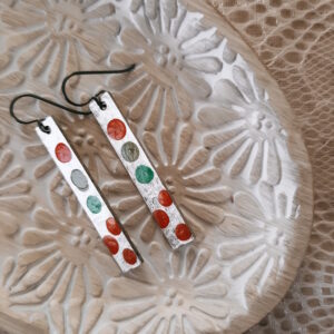 hand painted earrings with orange polka dots by french ostrich