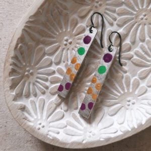 hand painted earrings with polka dots by french ostrich