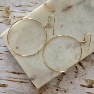 gold hoop earrings by french ostrich