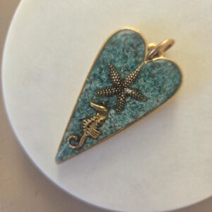 seahorse and star fish heart pendant by french ostrich