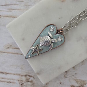 turtle and sea star necklace by french ostrich