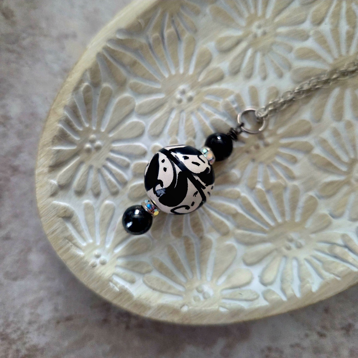 black sicilian ceramic bead necklace with silver chain by french ostrich