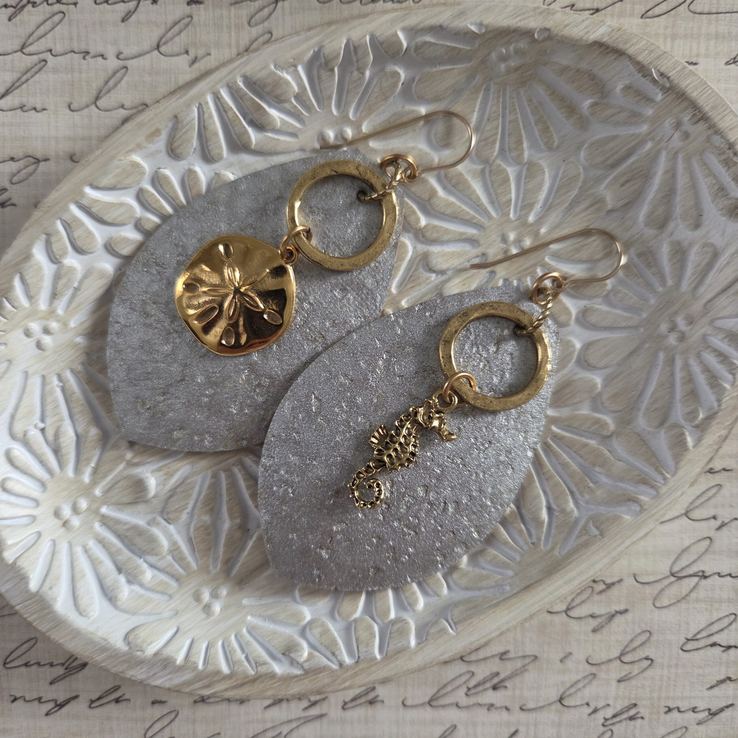 silver cork earrings with sea charms by french ostrich