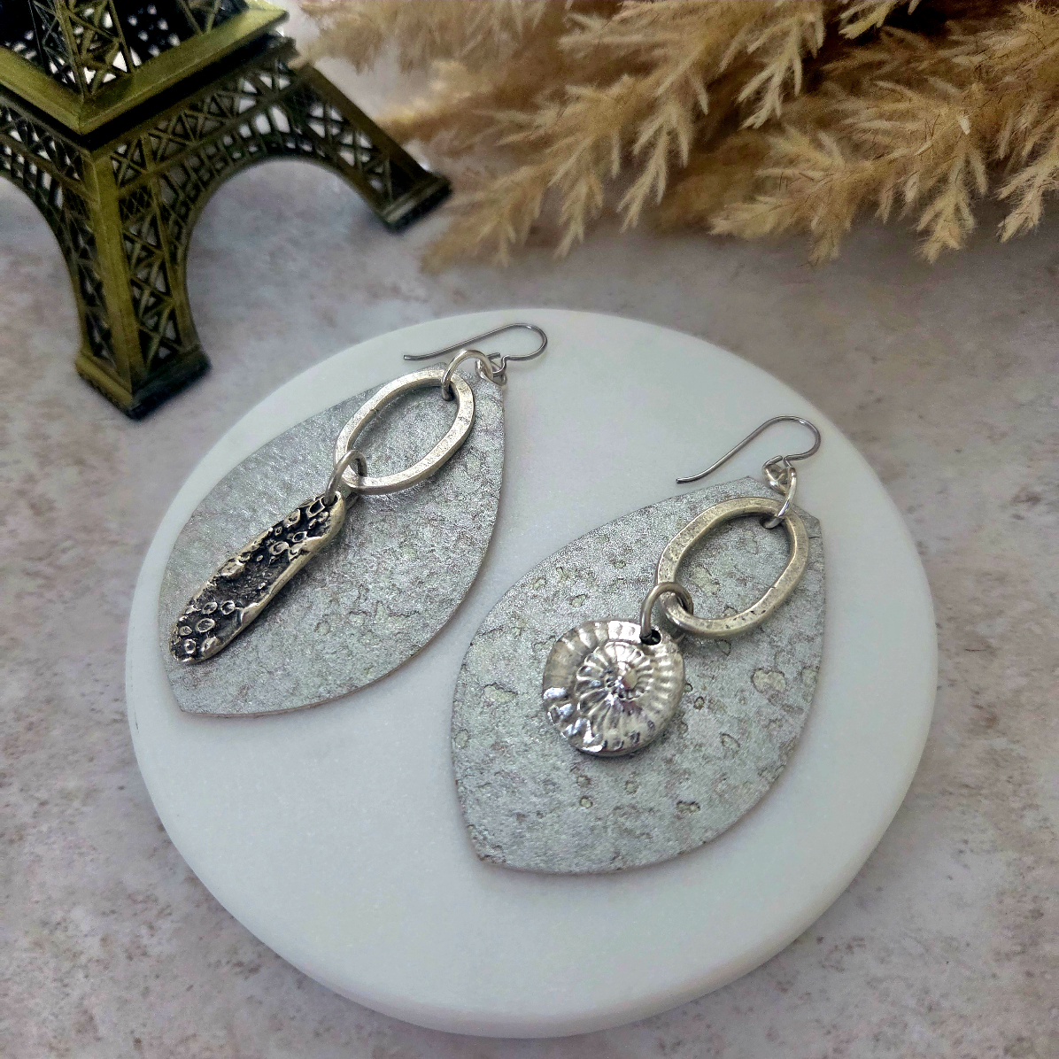 silver cork earrings with sea charms by french ostrich